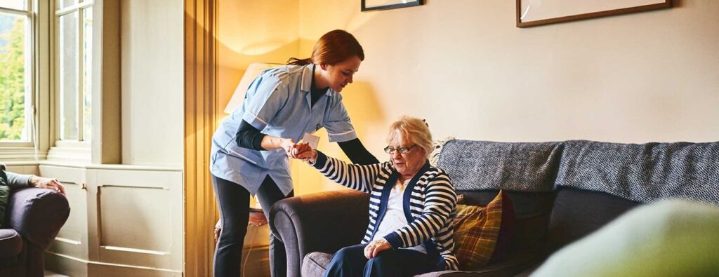 caregiver helps woman hero